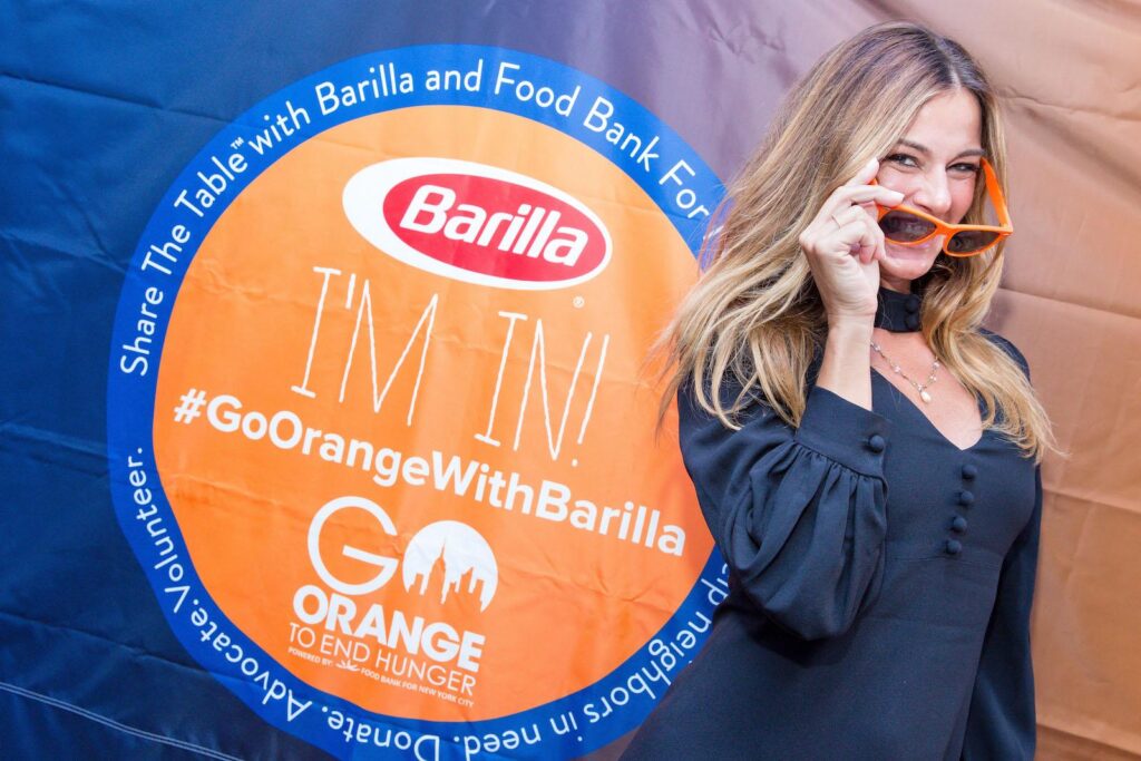 Food Bank Celebrity Ambassador Kelly Bensimon supporting “Go Orange With Barilla.” Photo: Eric Vitale