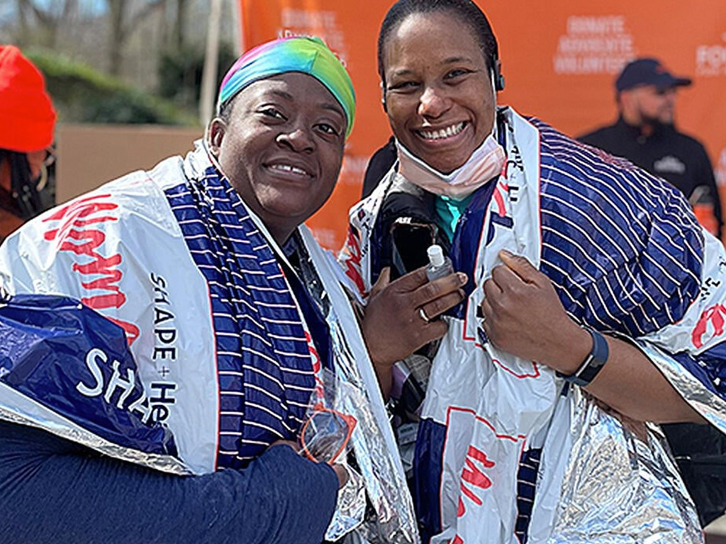 Past-events-5 Marathon runners smiling after the run