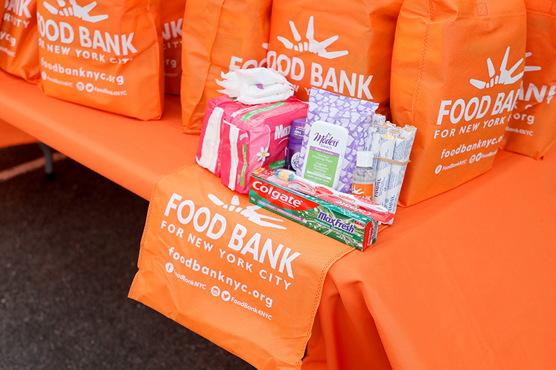 Food Bank NYC orange bags with hygene products
