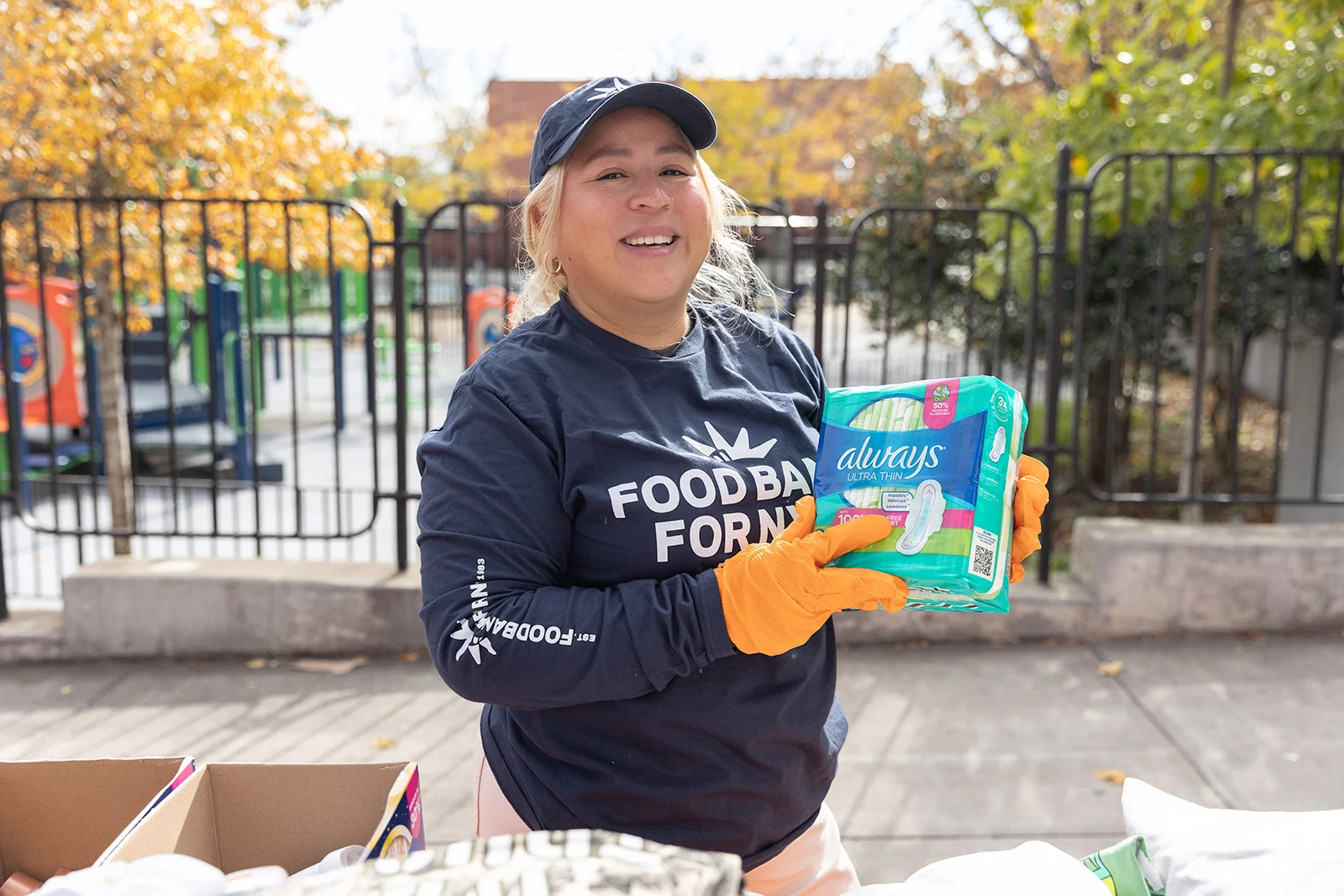 Woman holding Hygiene Products Smiling