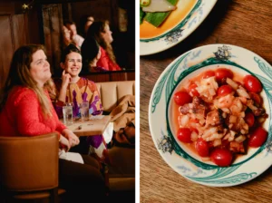 Guests smile beside a Peter Luger and Nobu plated dish.