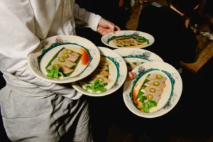 Five plates of jalapeño yellowtail sashimi served to Eat For Good guests.