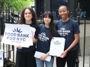 Malaika Walker, Aaliyah Bartholomew, and Niav Lorenzo outside New York City Hall during Food Bank For NYC’s ELAC Day of Action.